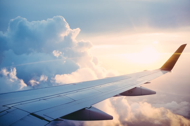 Aircraft wing above the clouds after take-off from Gatwick